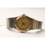 GENTLEMENS OMEGA CONSTELLATION AUTOMATIC WRISTWATCH, circular gold dial with gold hour markers and