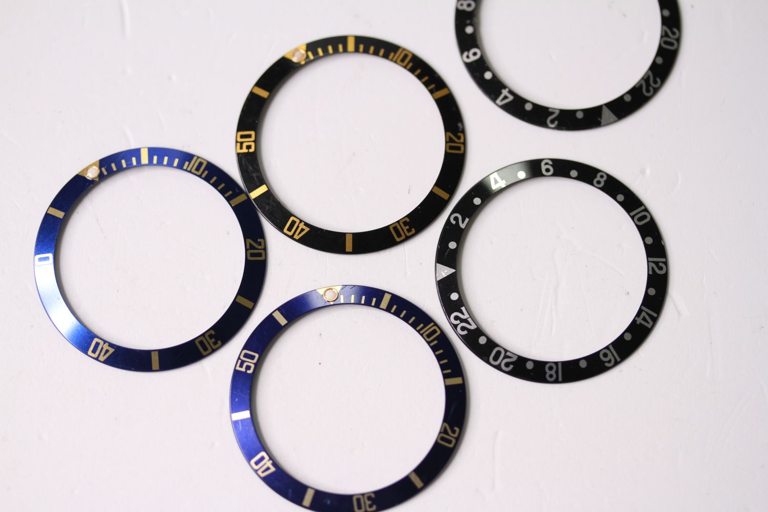 5x ROLEX BEZEL INSERTS, INCLUDING GMT AND BI-COLOUR SUBMARINERS, group of 5 Rolex bezel inserts, - Image 2 of 3