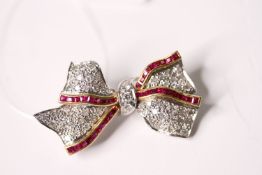 Diamond & Ruby Set Bow Brooch Circa 1970s, stamped 18ct gold, set with diamonds and rubies in a