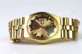 VINTAGE TISSOT AUTOMATIC PR516 GL WRIST WATCH, circular champagne dial with baton hour markers,