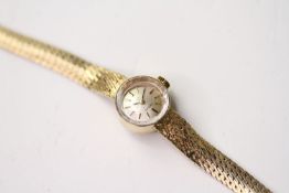 VINTAGE OMEGA WRISTWATCH, circular silver dial with baton hour markers, 14mm 14ct gold case, snap