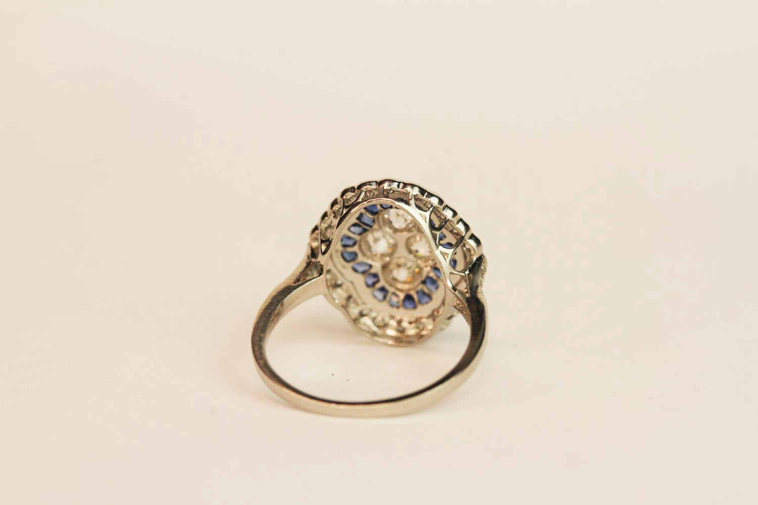 Platinum sapphire and diamond ring. Set with 4 central diamonds, surrounded by an inner halo of - Image 3 of 3