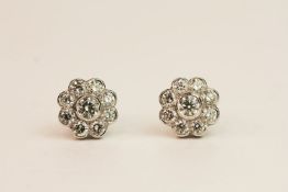 Pair Of Diamond Set Stud Earrings, in a daisy shap