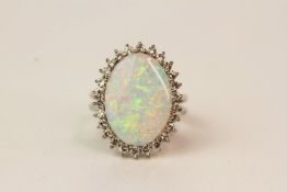 Oval Shaped Opal & Diamond Ring, with a double shank, diamonds