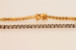 Diamond Line Bracelet, set with round brilliant cut diamonds, 18ct yellow gold, approximate total