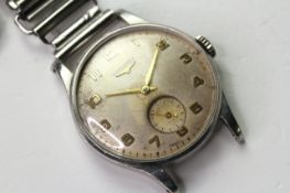 VINTAGE LONGINES WRIST WATCH, circular silver dial with arabic numeral hour markers, subsidary