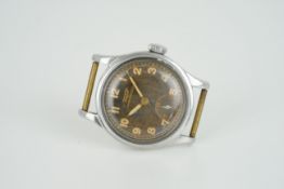 GENTLEMENS TISSOT ANITMAGNETIC WRISTWATCH, circular patina dial with arabic numeral hour markers and