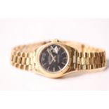LADIES 18CT ROLEX DATEJUST AUTOMATIC, circular black dial with applied hour markers, date function