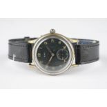 GENTLEMENS BWC GERMAN MILITARY WRISTWATCH, circular black dial with applied hour markers and