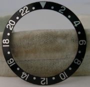 VINTAGE ROLEX GMT 1675 BEZEL INSERT, slight wear marks present at the 22 and between 6-8 0'clock