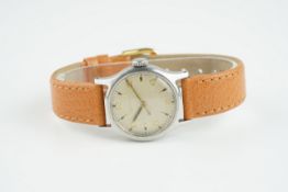 MID SIZE DOXA WRISTWATCH, circular patina dial with gold applied hour markers and hands, 28mm