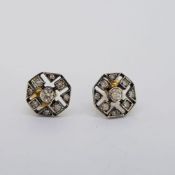 A pair of openwork octagonal earrings silver set with an estimated 0.60 carats of round diamonds