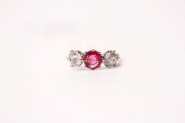 Ruby & Diamond 3 Stone Ring, set with a central ruby, claw set, 2 diamonds approximately 0.60ct