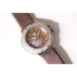 TAG HEUER FORMULA 1 WITH DIAMOND BEZEL QUARTZ WATCH, circular brown dial with baton and arabic