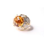 Citrine & Diamond Dress Ring, centre set with a citrine, 8 claw set, pave set diamonds, hammered