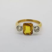 18 carat yellow and white gold, yellow sapphire and diamond 3 stone ring. Yellow sapphire