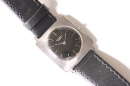 VINTAGE UNIVERSAL GENEVE WRIST WATCH, circular black dial with baton hour markers, 28mm square