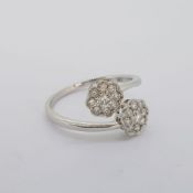 18 carat white gold modern crossover double cluster ring. Full hallmark. Approximate diamond