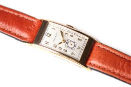 VINTAGE 10K GOLD FILLED LONGINES CURVEX, rectangular curved dial, silvered with gilt Roman numerals,