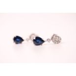 Pair of 18ct white gold pear-shaped sapphire and round-cut and baguette diamond drop earrings,