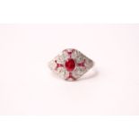 Platinum Victorian-style ruby and diamond ring in a filigree-style mount