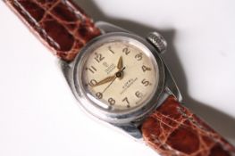 VINTAGE LADIES TUDOR ROYAL 1955, circular cream dial with arabic numeral hour markers, 22mm