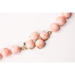 Coral Bead Necklace, diamond set clasp, approximate length 71cm.