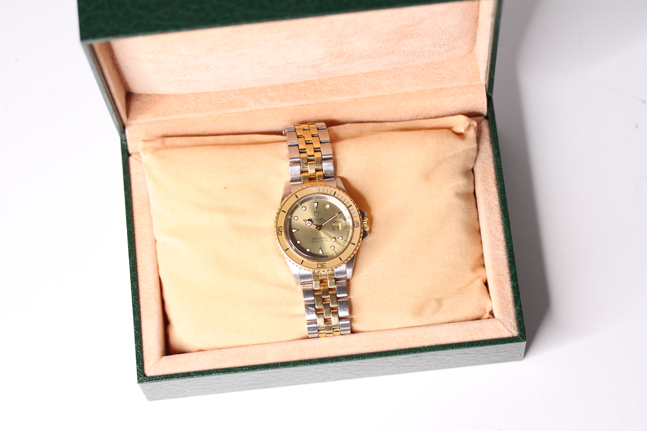 LADIES TUDOR MINI-SUB STEEL AND GOLD WRIST WATCH WITH BOX, circular champagne dial with applied hour