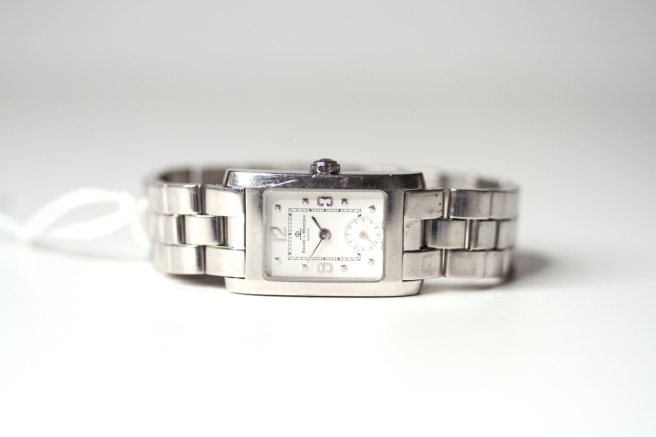 BAUME & MERCIER WRISTWATCH, rectangular white dial with dot hour markers and arabic numbers 3, 9 and