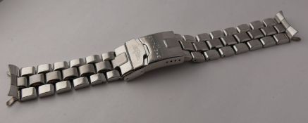 Genuine Breitling 20mm Bracelet. Please note this is a used band that shows age and wear that