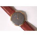 VINTAGE CORUM WRIST WATCH, circular grey dial, 34mm gold plated case, brown leather strap, snap case