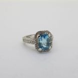 18 carat white gold Aquamarine and Diamond dress ring. Estimated 3.40 carats oval aquamarine claw