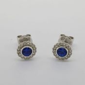 18 carat white gold sapphire and diamond earrings, posts stamped 750, butterflies 18K. Sapphires