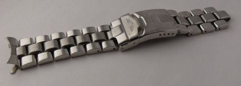 incomplete Genuine Breitling 20mm Bracelet, with one end link marked SCA. Clasp does not lock