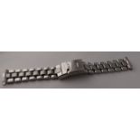 Genuine Breitling 18mm Bracelet. Please note this is a used band that shows age and wear that