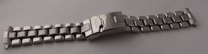 Genuine Breitling 18mm Bracelet. Please note this is a used band that shows age and wear that