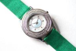 LADIES 18CT MAUBOUSSIN MOTHER OF PEARL DIAL DIAMOND BEZEL WATCH WITH BOX, circular mother of pearl
