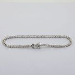 18 carat white gold diamond line bracelet, 70 Round Brilliant Cut diamonds, approximately 3.25