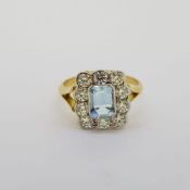 18 carat yellow gold octagonal cut aquamarine and round brilliant cut diamond small tablet ring with