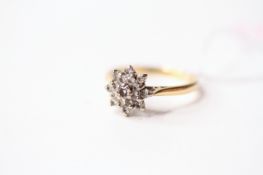 Diamond Cluster Ring, stamped 18ct yellow gold, size O, 3.78g