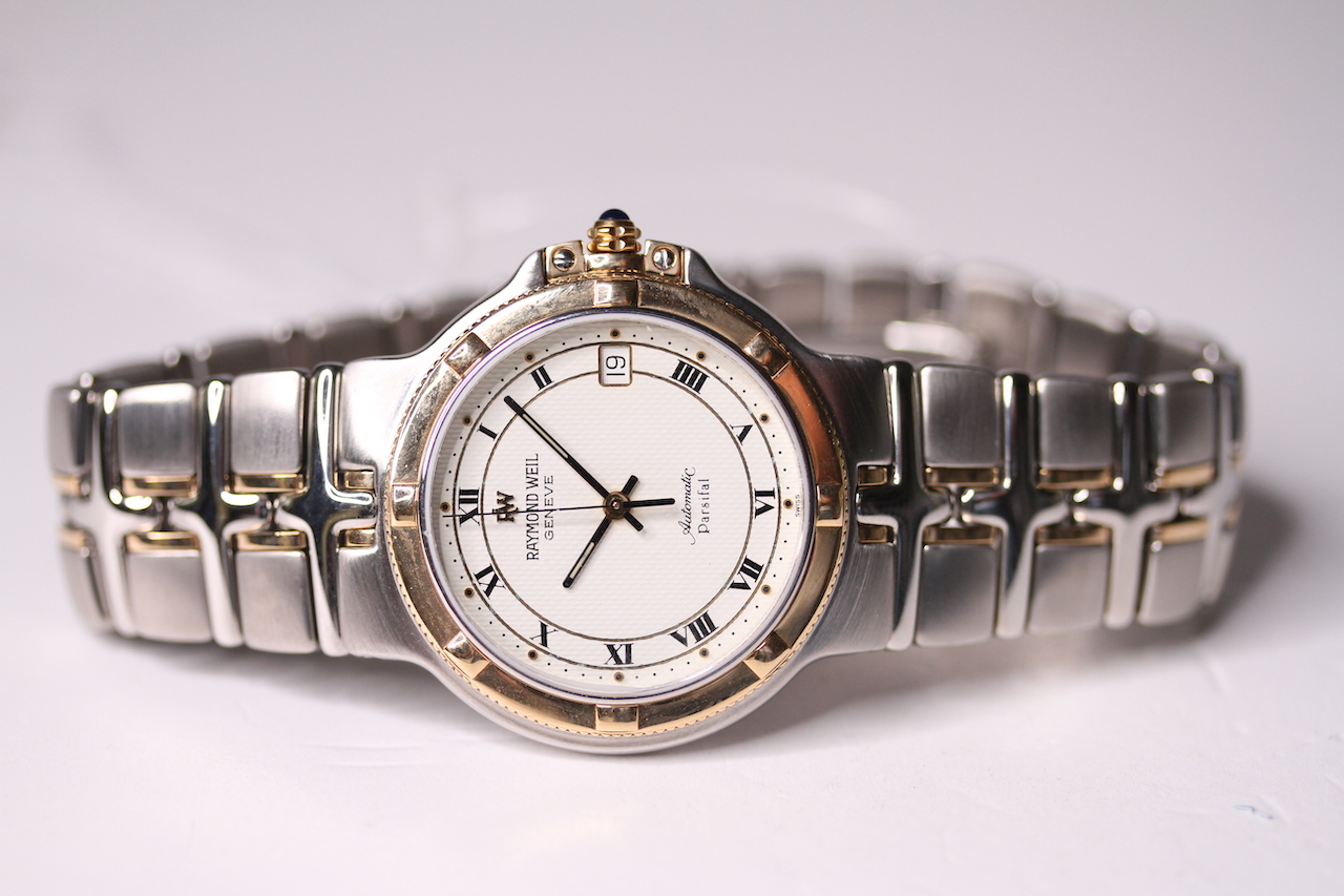 RAYMOND WEIL PARSIFAL BI-COLOUR AUTOMATIC, circular white dial with roman numeral hour markers, date