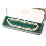 String of Pearls with a diamond clasp, graduating pearls strung knotted, 6mm - 9mm, strung