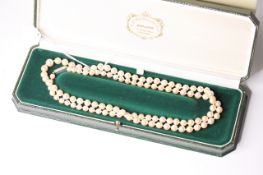String of Pearls with a diamond clasp, graduating pearls strung knotted, 6mm - 9mm, strung