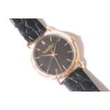 VINTAGE 18CT IWC WRIST WATCH 1956, circular black dial with gold baton hour markers, 36mm 18ct