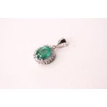 18ct white gold oval emerald and round-cut diamond cluster pendant, boxed