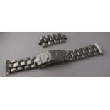 Genuine Breitling 18mm Bracelet. Please note several pins are missing, which can be removed from the