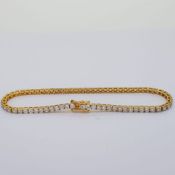 18 carat yellow gold diamond line bracelet, 70 Round Brilliant Cut diamonds, approximately 3.25