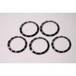 5x ROLEX SUBMARINER 16610 BLACK BEZEL INSERTS, group of 5 16610 Rolex Submariner bezel inserts,