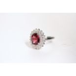 Pink Tourmaline and Diamond Cluster Ring, oval vibrant pink tourmaline, 10.7x8.5mm, with bright