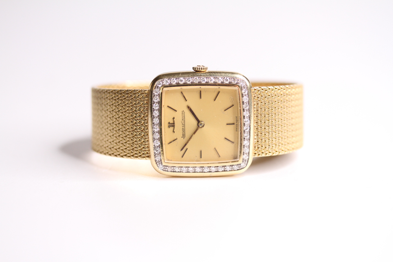 VINTAGE 18CT JAEGER LE-COULTRE WRIST WATCH WITH DIAMOND BEZEL AND JLC BOX, cushion champagne dial - Image 2 of 4